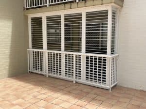 transform-your-outdoor-oasis-with-aluminum-shutters-image-2